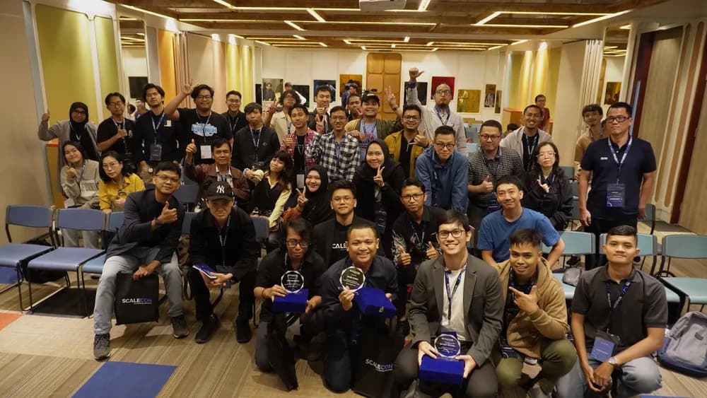 A group photo at the end of a SCALECON Jakarta 2025 workshop session