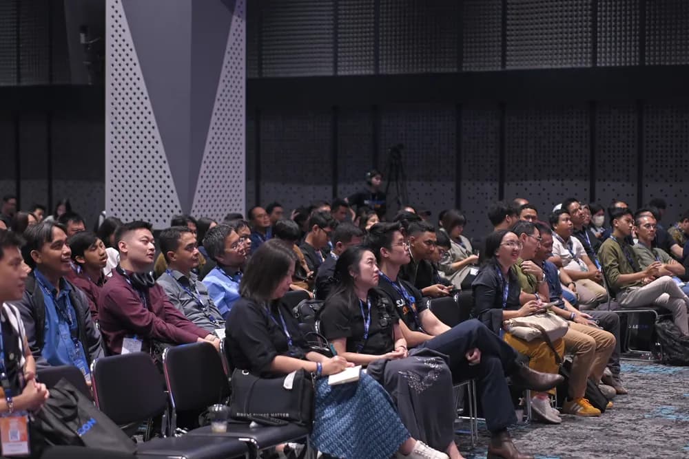 Rows of attendees watching a session at SCALECON Surabaya 2026